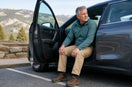 Driver pausing comfortably before taking the first steps after a long trip